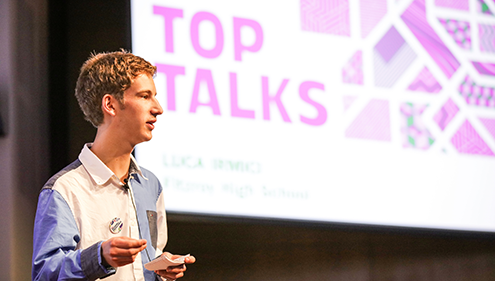 Luca presenting in Top Talks