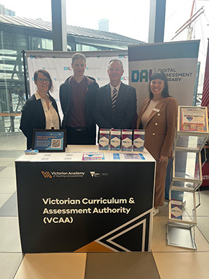 2 women and 2 men at the VCAA booth